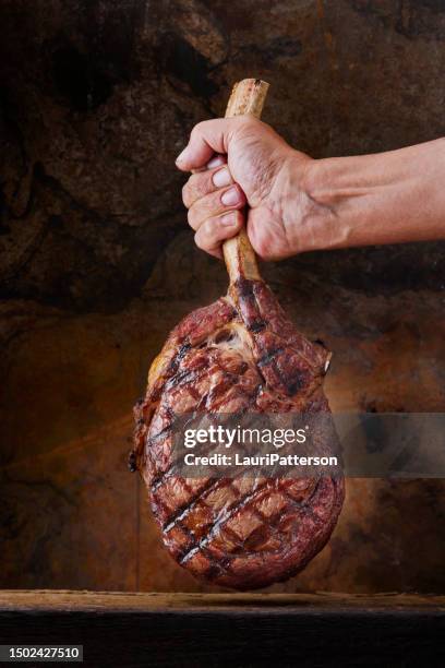 the king of steaks "the tomahawk" - tomahawk stock pictures, royalty-free photos & images