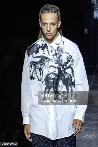 Model walks the runway during the Taakk Ready to Wear Spring/Summer 2024 fashion show as part of the Paris Men Fashion Week on June 25, 2023 in...