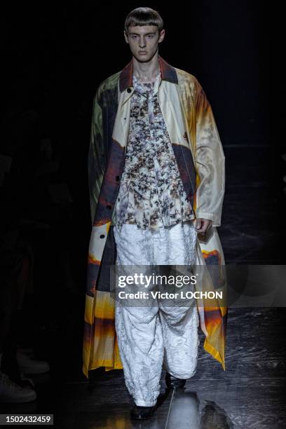 Model walks the runway during the Taakk Ready to Wear Spring/Summer 2024 fashion show as part of the Paris Men Fashion Week on June 25, 2023 in...