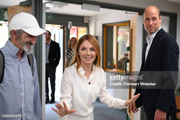 Prince William, Prince of Wales and Geri Halliwell meet children during a visit to Maindee Primary School on June 26, 2023 in London, England. The...