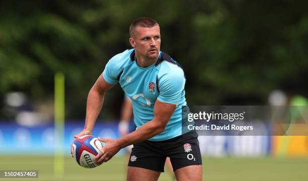 Henry Slade passes the ball during the England training session held at The Lensbury on June 26, 2023 in Teddington, England.