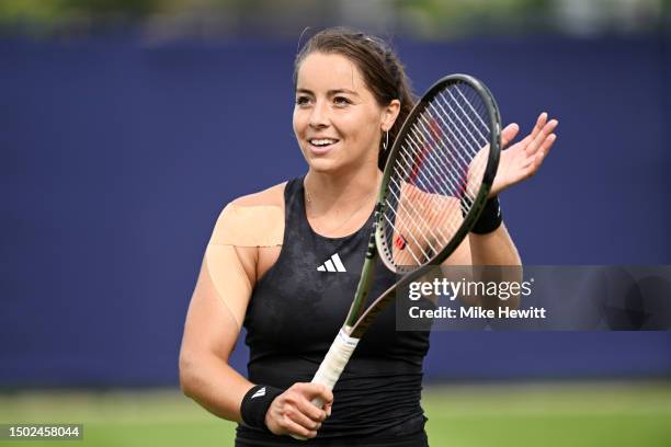 Jodie Burrage of Great Britain celebrates winning match point against Lauren Davis of United States in the Women's Singles First Round match during...