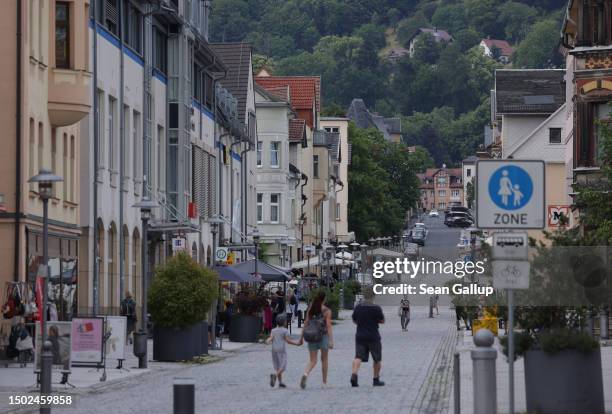 People walk in the town center two days after the local district administrator election on June 26, 2023 in Sonneberg, Germany. On June 24 Robert...