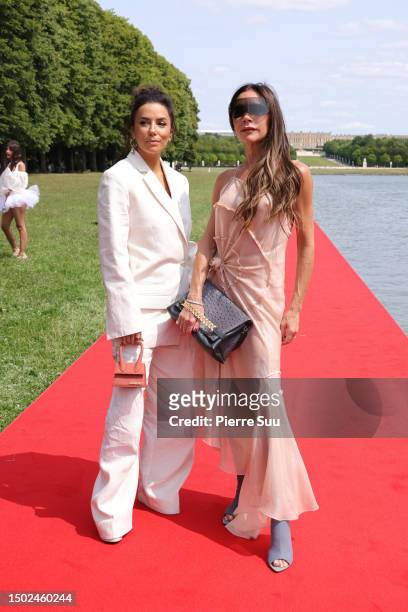 Eva Longoria and Victoria Beckham attends the "Le Chouchou" Jacquemus' Fashion Show at Chateau de Versailles on June 26, 2023 in Versailles, France.