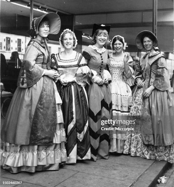 Passing shoppers asked What the Dickens is going on here? at the J T Parrish department store in Byker. These lovely women are getting customers in...