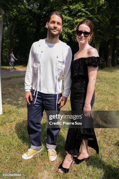 Simon Porte Jacquemus and Claire Foy are seen during the "Le Chouchou" Jacquemus' Fashion Show at Chateau de Versailles on June 26, 2023 in...