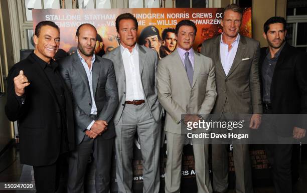 Jean-Claude Van Damme, Jason Statham, Arnold Schwarzenegger, Sylvester Stallone, Dolph Lundgren and Scott Adkins attend a photocall for The...