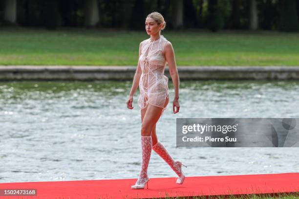 Gigi Hadid walks the runway during "Le Chouchou" Jacquemus' Fashion Show at Chateau de Versailles on June 26, 2023 in Versailles, France.