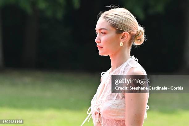 Gigi Hadid walks the runway during "Le Chouchou" Jacquemus' Fashion Show at Chateau de Versailles on June 26, 2023 in Versailles, France.