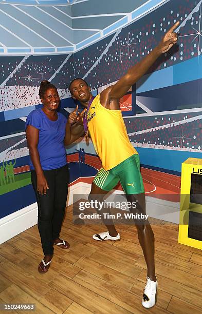 Jennifer Bolt visits the wax figure of her son Usain Bolt after his triple gold London 2012 Olympic success at Madame Tussauds on August 13, 2012 in...