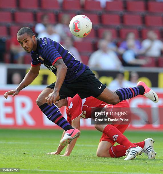 Theo Walcott of Arsenal in action against FC Cologne during Pre-Season Friendly game at Rhein Energie Stadium on August 12, 2012 in Cologne, Germany.