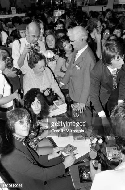 Yoko Ono launches her new book Grapefruit accompanied by her husband, former Beatle John Lennon July 1971.