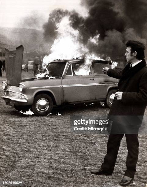 George Terrace sets fire to his car to draw attention to shoddy workmanship of today's cars.