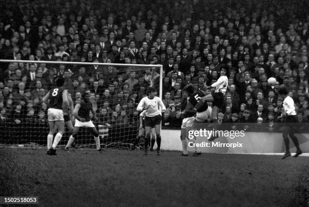English League Division One match at Upton ParkWest Ham United 1 v Liverpool 2. Larry Lloyd the Liverpool centre half beats West Ham's Tommy Taylor...