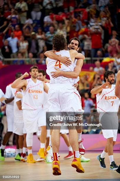 Summer Olympics: Spain Jose Calderon victorious hugging Pau Gasol during game vs Russia at Men's Semifinals at North Greenwich Arena. London, United...