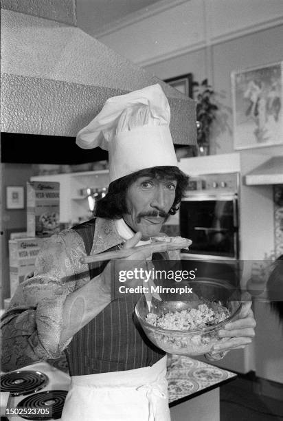 Peter Wyngarde star of the the TV series Jason King and Department S He is dressed in a chef's hat and Apron for his latest episode of Jason King in...