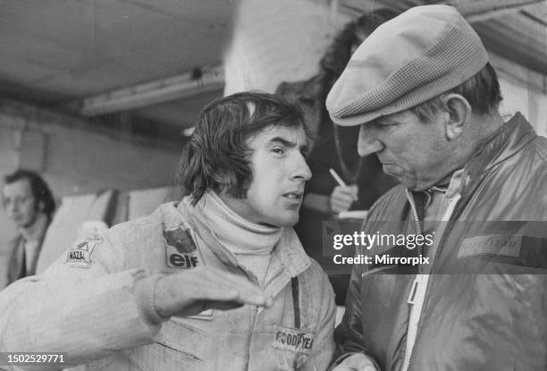 Jackie Stewart and Ken Tyrrell talking in the pits at Brands Hatch. October 1971.