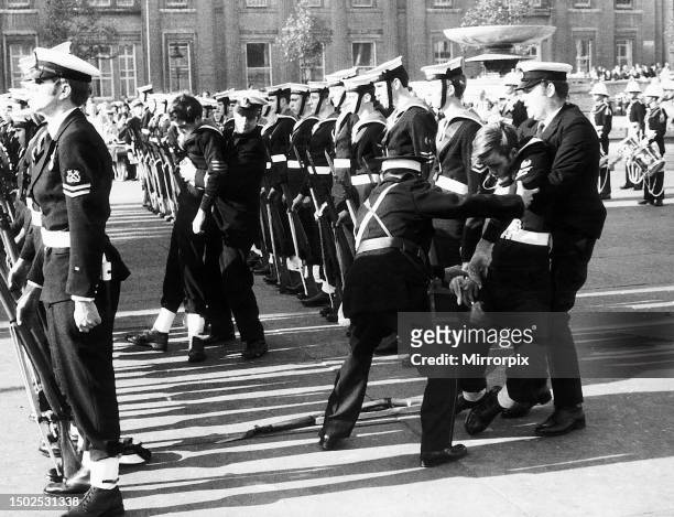Passing out Parade, five boy sailors fainted under the heat at an annual Trafalgar Day celebration in Trafalgar Square, London, Sunday 24th October...