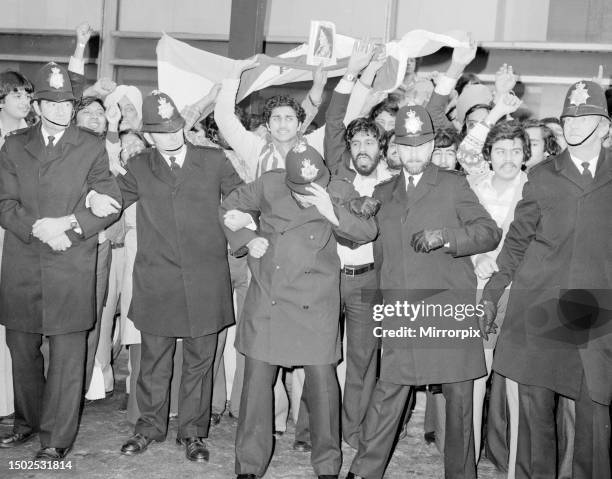 Sikhs demonstrate outside the terminal buildings at Heathrow against the visit of Mrs Indira Gandhi Indian Prime Minister who is visiting the UK for...