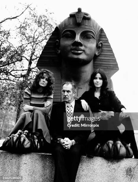 Actor Vincent Price as Dr. Phibes with actresses Fiona Lewis and Valli Kemp sit besides Cleopatra's Needle in London the day before thay begin...