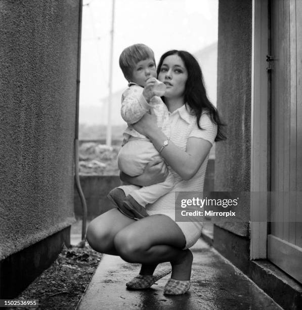 Mother with her two year old boy toddler. December 1969.
