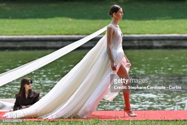 Model walks the runway during "Le Chouchou" Jacquemus' Fashion Show at Chateau de Versailles on June 26, 2023 in Versailles, France.