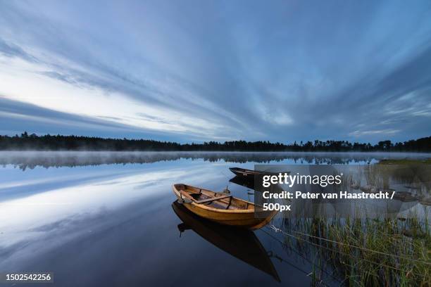 scenic view of lake against sky,sweden - förtöjd bildbanksfoton och bilder