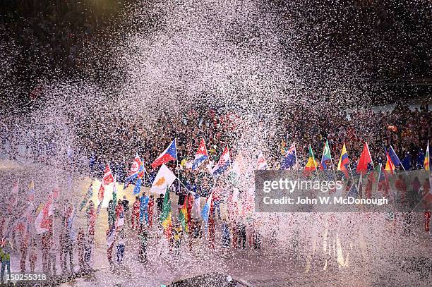 Summer Olympics: Overall view of confetti falling onto flag bearers during Parade of Nations and Ahtletes at Olympic Stadium. London, United Kingdom...