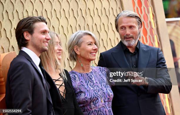 Carl Jacobsen Mikkelsen, guest, Hanne Jacobsen and Mads Mikkelsen attend the UK Premiere of Lucasfilm' "Indiana Jones and the Dial of Destiny" at...