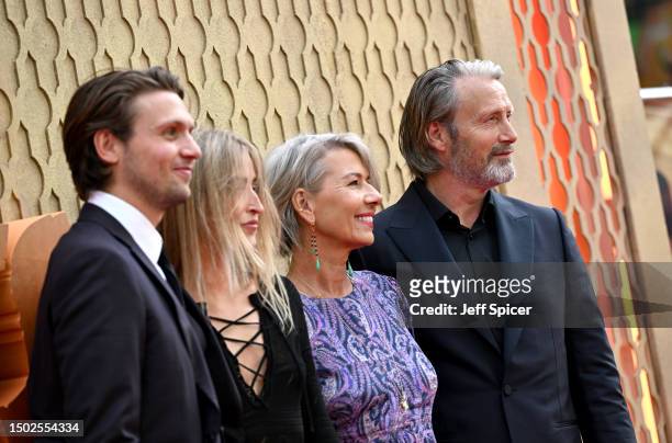 Carl Jacobsen Mikkelsen, guest, Hanne Jacobsen and Mads Mikkelsen attend the UK Premiere of Lucasfilm' "Indiana Jones and the Dial of Destiny" at...
