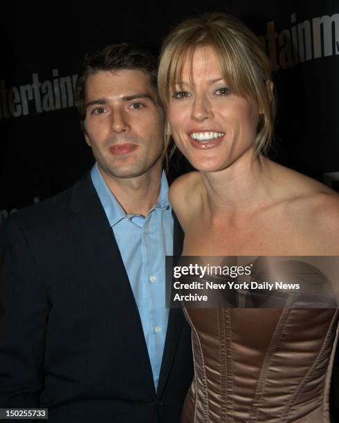 Julie Bowen with her fiance real estate investor and software developer Scott Phillips at the Entertainment Weekly Academy Awards Viewiing Party held...