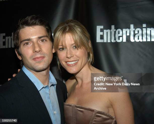 Julie Bowen with her fiance real estate investor and software developer Scott Phillips at the Entertainment Weekly Academy Awards Viewiing Party held...