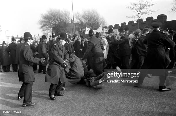 Students demonstration against the Springboks and apartheid system. Students charge through the line of policemen in Talbot road, but not many got...