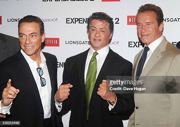Jean-Claude Van Damme, Sylvester Stallone and Arnold Schwarzenegger attend the UK premiere for The Expendables 2 at Simpsons On The Empire Leicester...