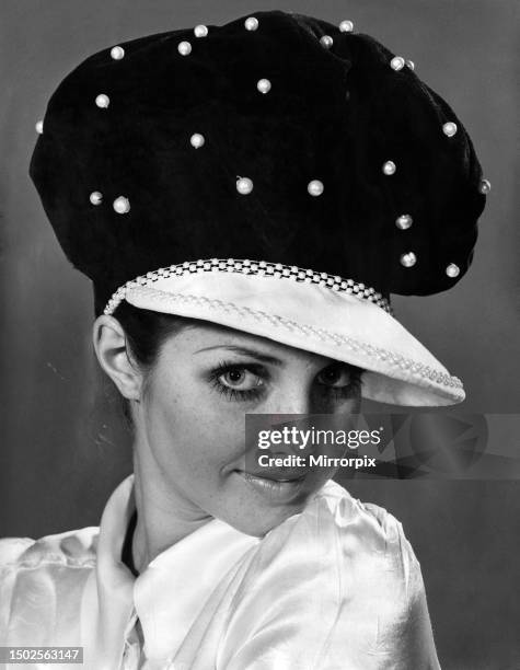 Reveille Fashion. Shirley Hounsell. Sunday best. Black and sophisti-cap is made in velvet. It is trimmed with pearl beads on the crown, and beads...