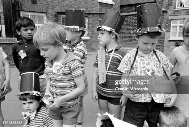 Children reenact a wedding at the Sir William Burrough's Primary School in Salmon Lane, Stepney. This afternoon Miss Samantha Docherty married Graham...