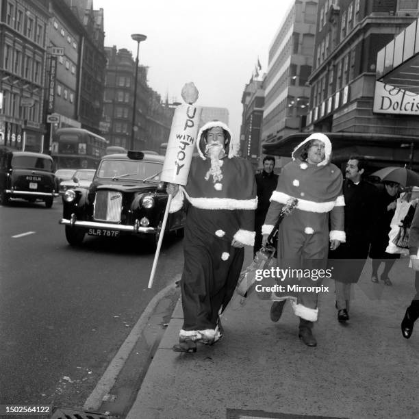 In Oxford Street today, a newly-formed trade union for Father Christmases, picketed Selfridges store. The aim is 'to protect the fantasies of...