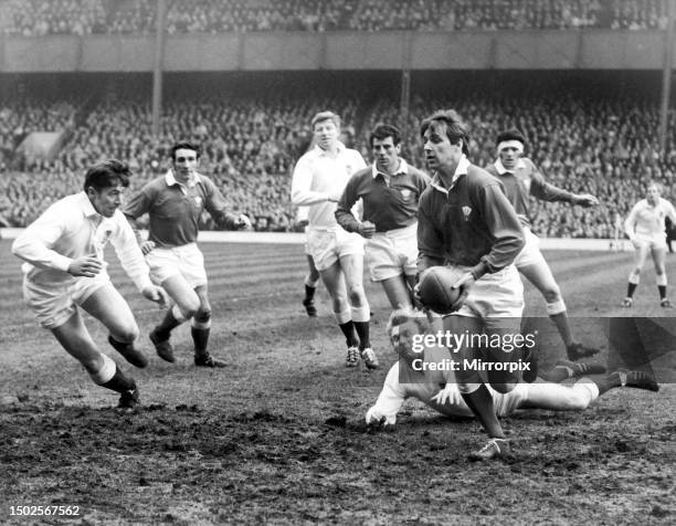 Wales versus England. Barry John, the Welsh fly-half makes a break against England with support from Dai Morris and Mervyn Davies . 28th February...