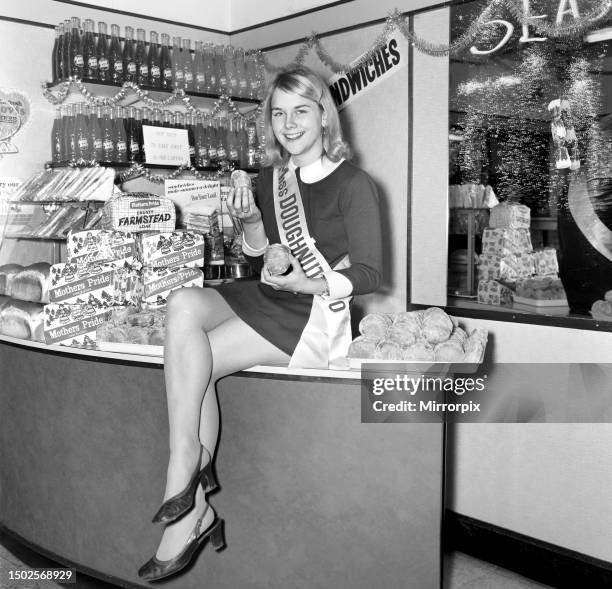 Years old Janet Cowell of Newton Abbot, winner of the National Contest for Miss Doughnut. Janet won here way to the title through local and Western...