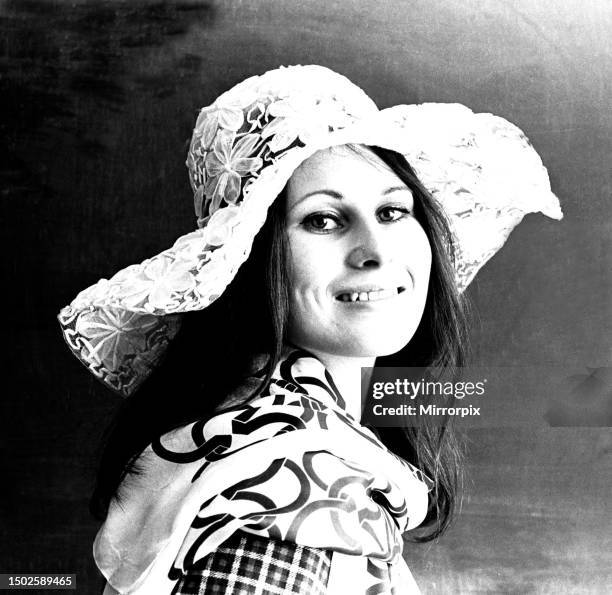 Model posing with a floppy hat in April 1971.