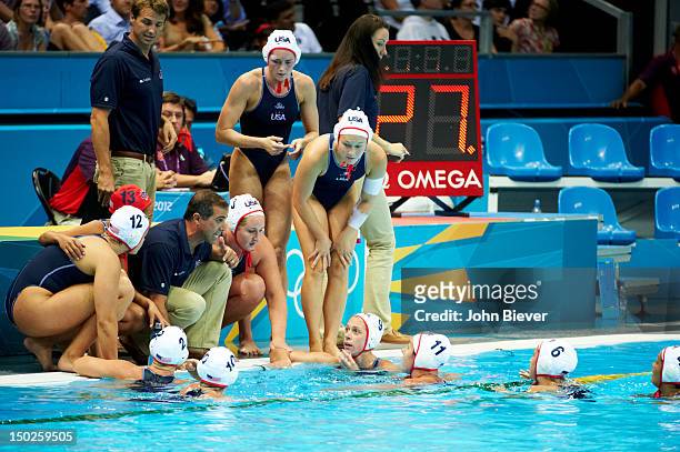 Summer Olympics: USA coach Adam Krikovian talking with his players Heather Petri , Melissa Seidemann , Maggie Steffens , Elsie Windes , Kelly Rulon ,...