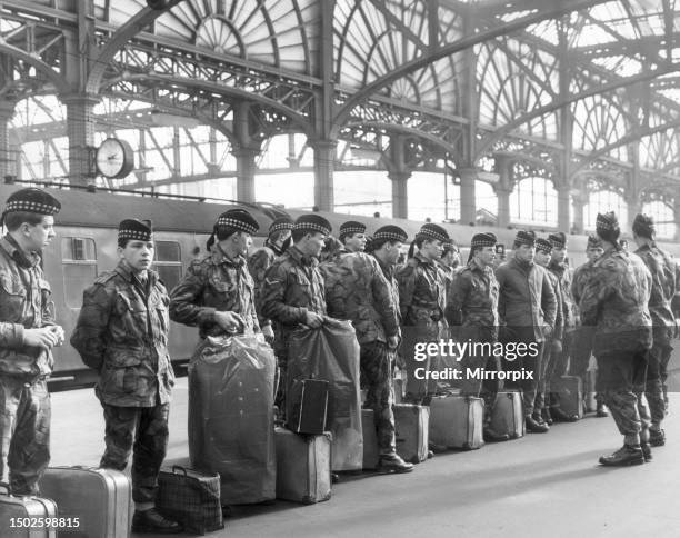 Soldiers who will be providing firing squad at the funerals for 3 murdered scottish soldiers arrive from Ireland at Central Station, Glasgow March...