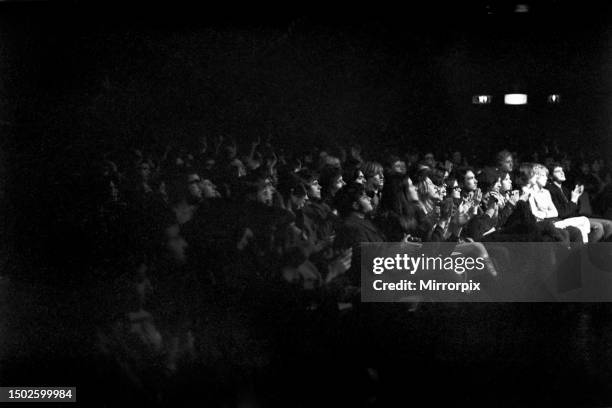 The Rolling Stones performing on stage at the Free Trade Hall, Manchester. The audience cheering and clapping during the show. March 1971.