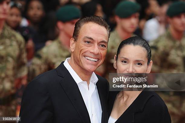 Jean-Claude Van Damme and Gladys Portugues attend the UK film premiere of The Expendables 2 on August 13, 2012 in London, United Kingdom.