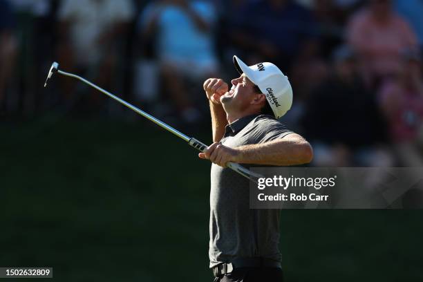 Keegan Bradley of the United States celebrates on the 18th green after winning the Travelers Championship at TPC River Highlands on June 25, 2023 in...