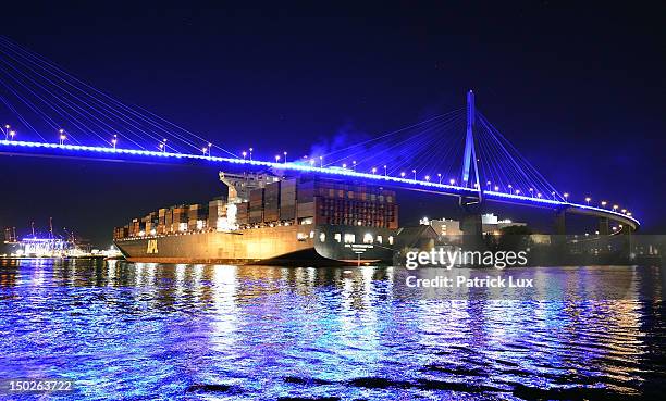 The Koehlbrandbruecke, the main bridge in the harbour, is illuminated in blue light during the "Hamburg Blue Port" light installation on August 13,...