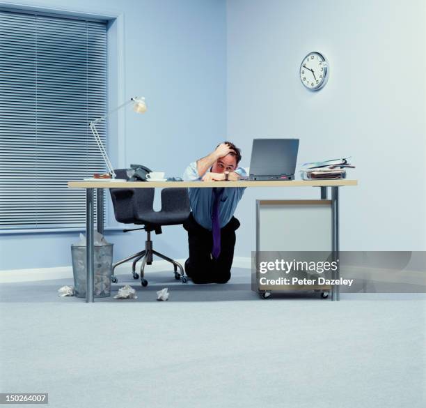 stressed businessman in the office,4:50pm - defeat funny stock pictures, royalty-free photos & images