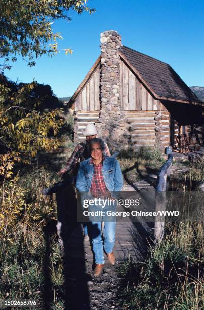 Fashion designer Ralph Lauren is photographed for W Magazine on October 7, 1985 in front of the guest house or "cottage" of the "Double RL" ranch,...