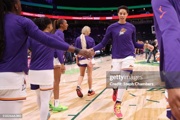 Brittney Griner of the Phoenix Mercury warms up before the game against the Seattle Storm at Climate Pledge Arena on June 24, 2023 in Seattle,...