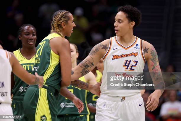 Mercedes Russell of the Seattle Storm greets Brittney Griner of the Phoenix Mercury before the game at Climate Pledge Arena on June 24, 2023 in...